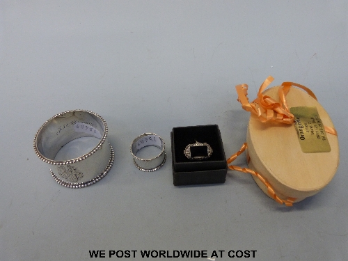 A 9ct gold Art Deco ring, a silver ring set with a pink stone and two white metal napkin rings