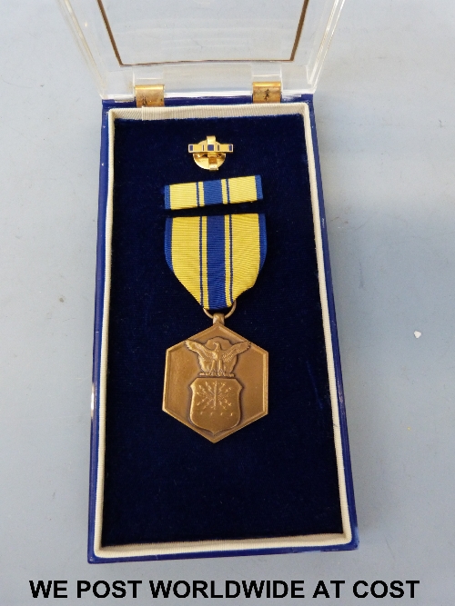 US Air Force Commendation medal in posthumous presentation case.