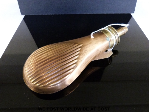 A Dixson flash proof brass powder flask