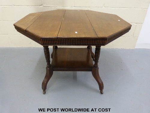 Octagonal 19th/20thC dining table with gallery under.