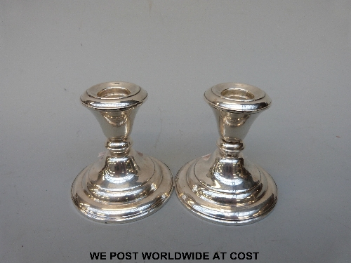 Pair of sterling silver candlesticks height 8.5cm