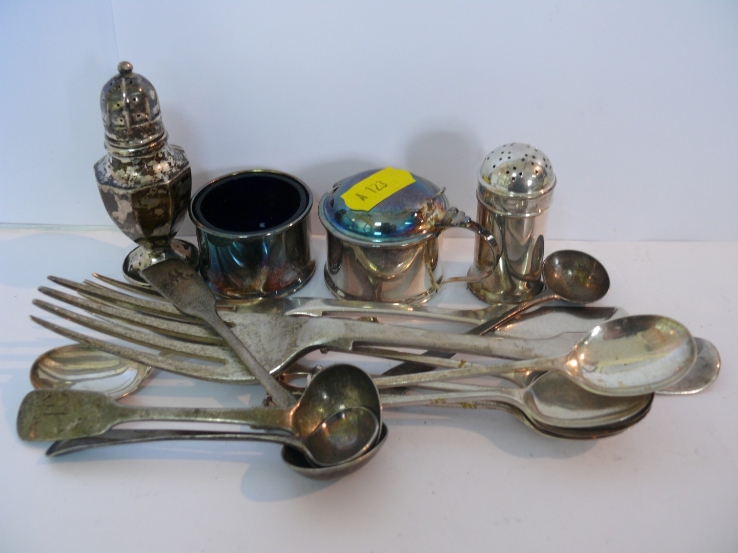 A set of six silver seal topped teaspoons by S Ltd, Birmingham 1925; together with a silver three