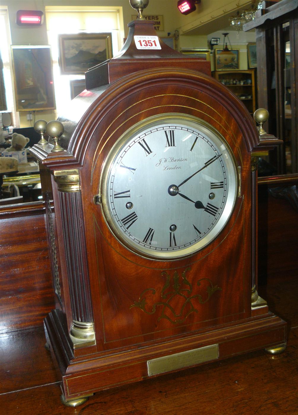 A good 1920s, George III style, figured mahogany and brass inlaid bracket type clock, the 6 inch