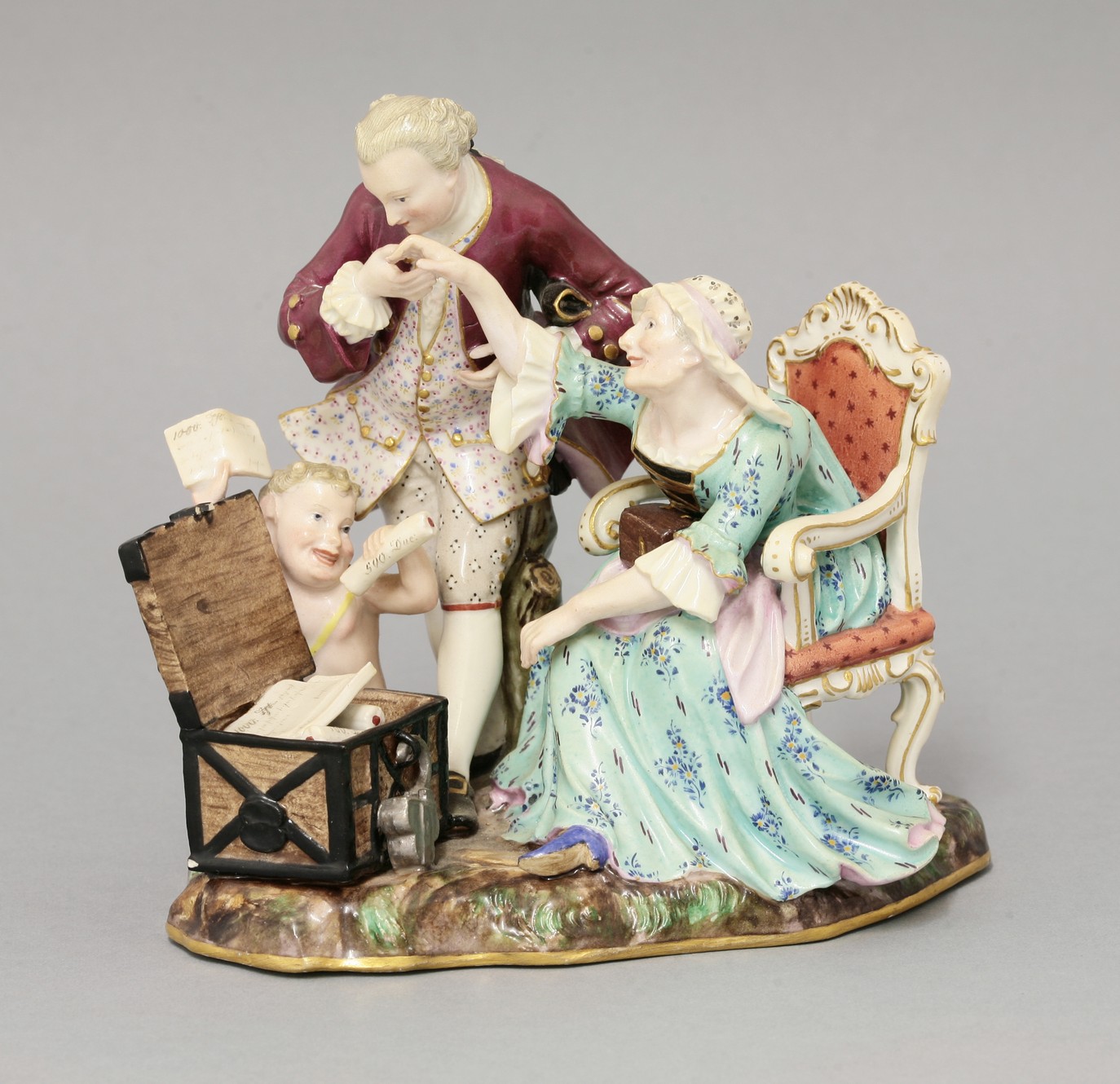 A rare Meissen Group,
early 19th century,of an amorous gerontophile, well modelled and coloured with