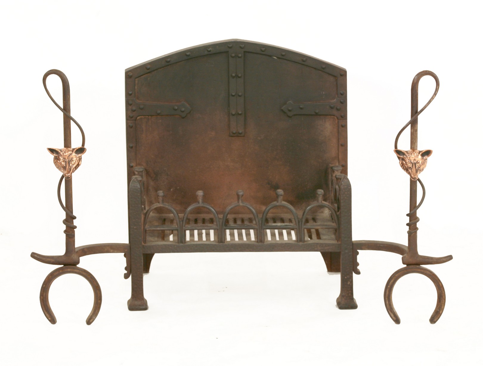 An unusual wrought iron fire basket,
early 20th century, the integral andirons in the form of riding