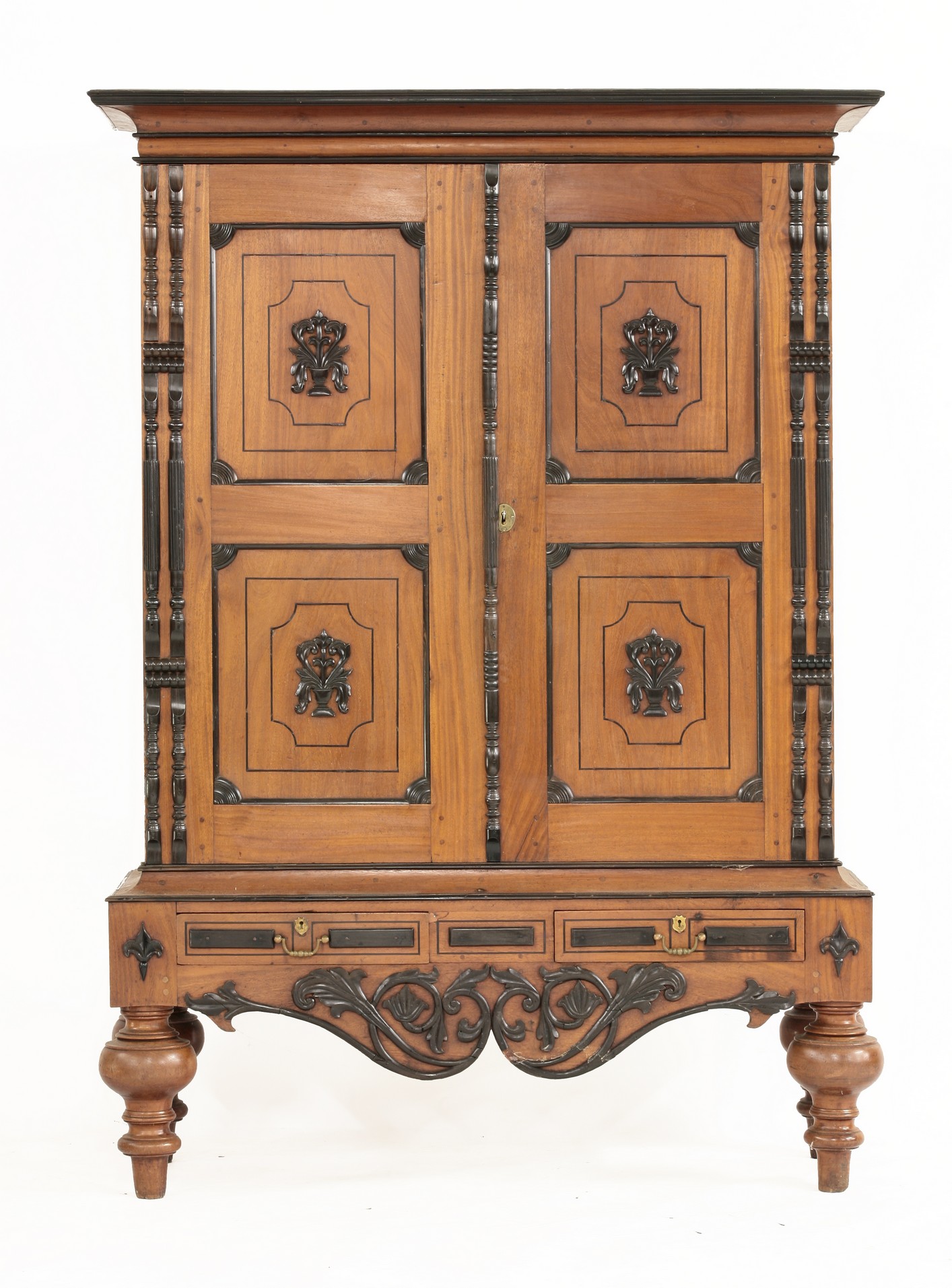 A Sri Lanka hardwood livery cupboard,
mid 19th century, with ebonised stringing and applied