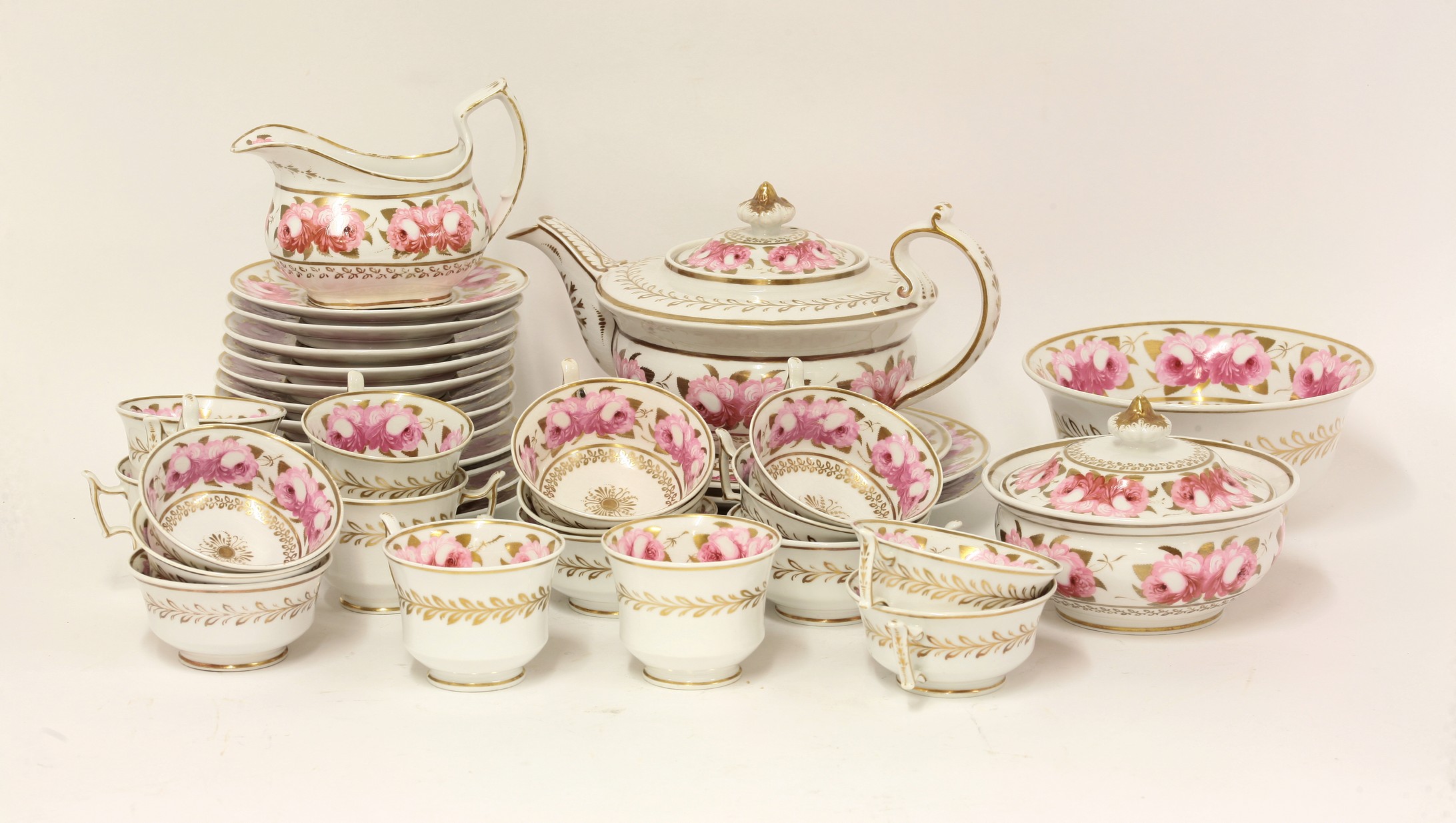 A Chamberlain's Worcester part Tea Service,
c.1815-20, each piece decorated with a band of pink