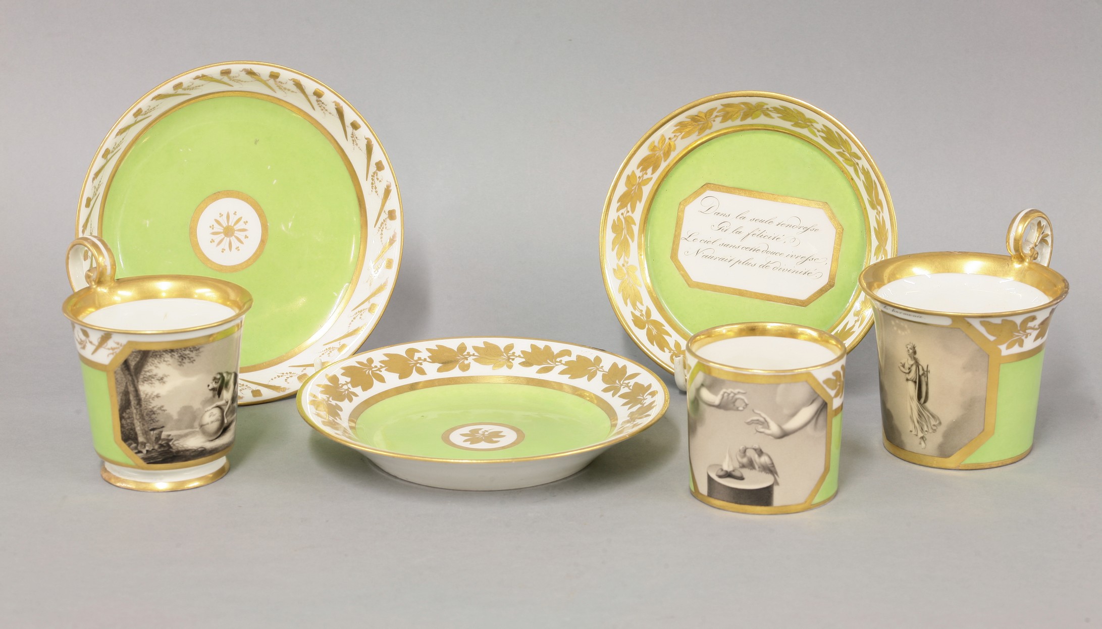 Two Vienna Cabinet Cups and Saucers,
c.1815, both with apple-green ground, one with a grisaille