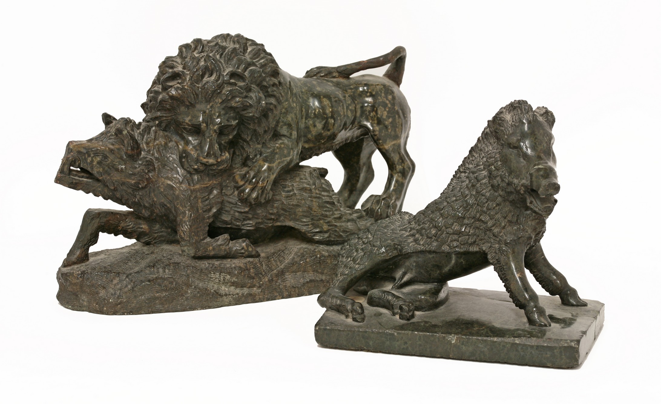 Two green marble Grand Tour souvenirs, 
a Lion and Boar group,
32cm long 
23cm high, and
the