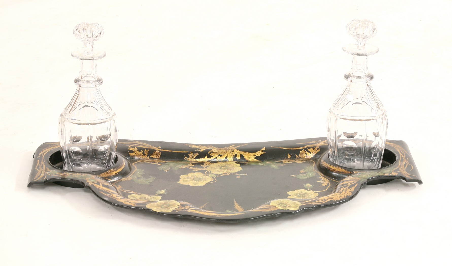 A Jennens & Bettridge japanned papier-mâché wine tray,
brightly decorated with trailing poppies