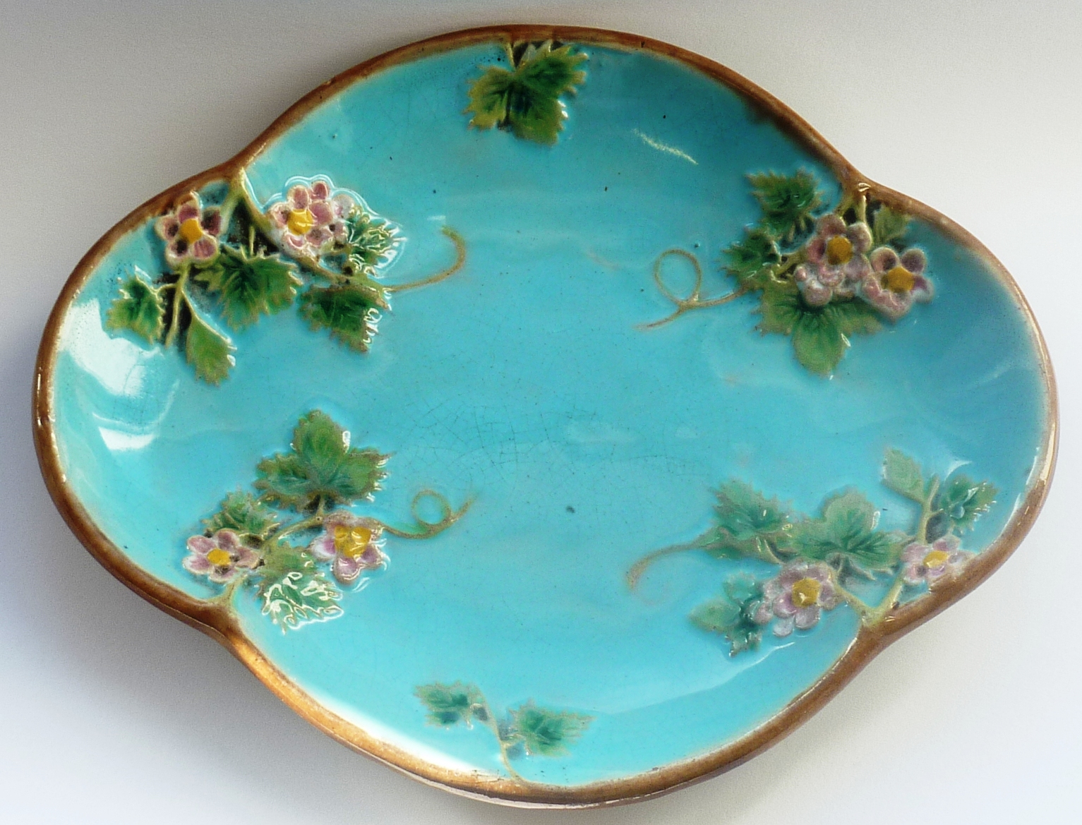 A 19th Century George Jones Majolica Dish in typical colouring, registration diamond to back for