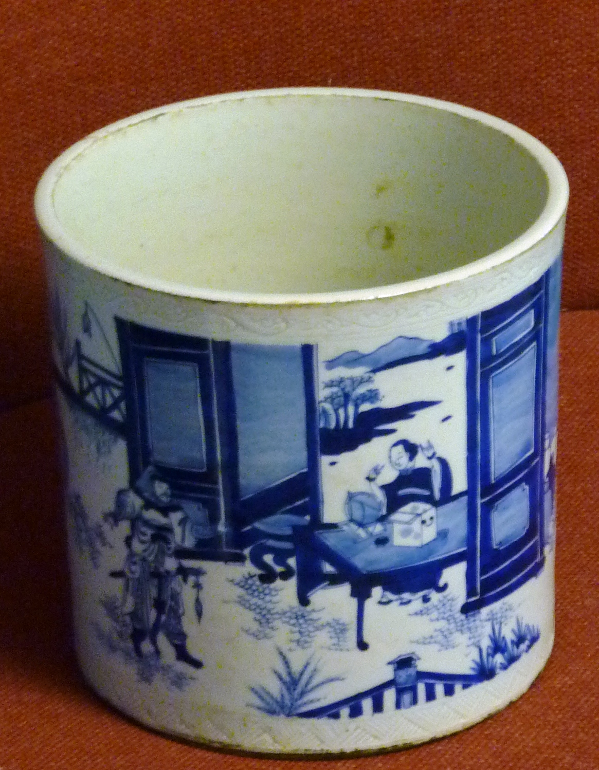 ADDED LOT  A large Chinese porcelain Brush Pot, hand decorated in underglaze blue with a