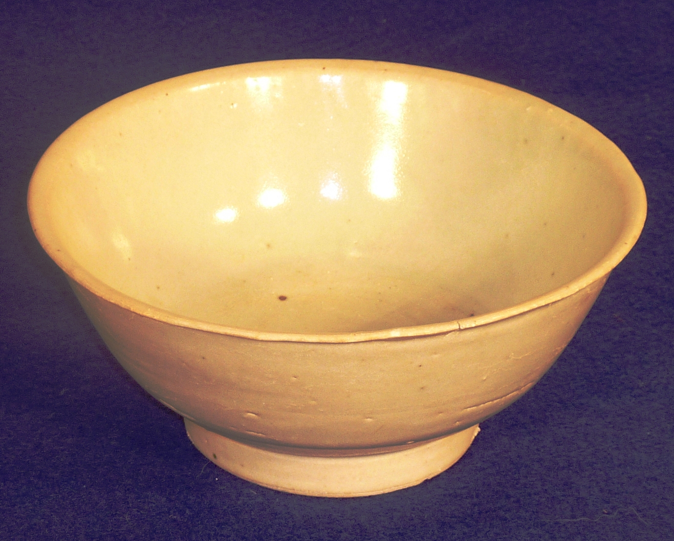 Tek Sing Cargo, a plain Celadon glaze Bowl raised on circular foot, labels to underside, (small