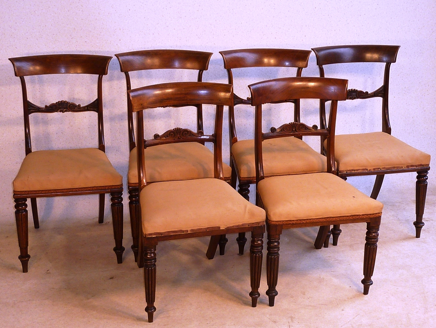 A Harlequin set of 19th Century mahogany Dining Chairs (4+2) in the late Regency style, two having