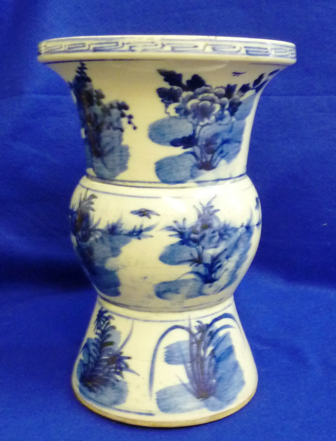 19th century Chinese ZUN Wine Beaker decorated with calligraphic floral hand painting in cobalt blue