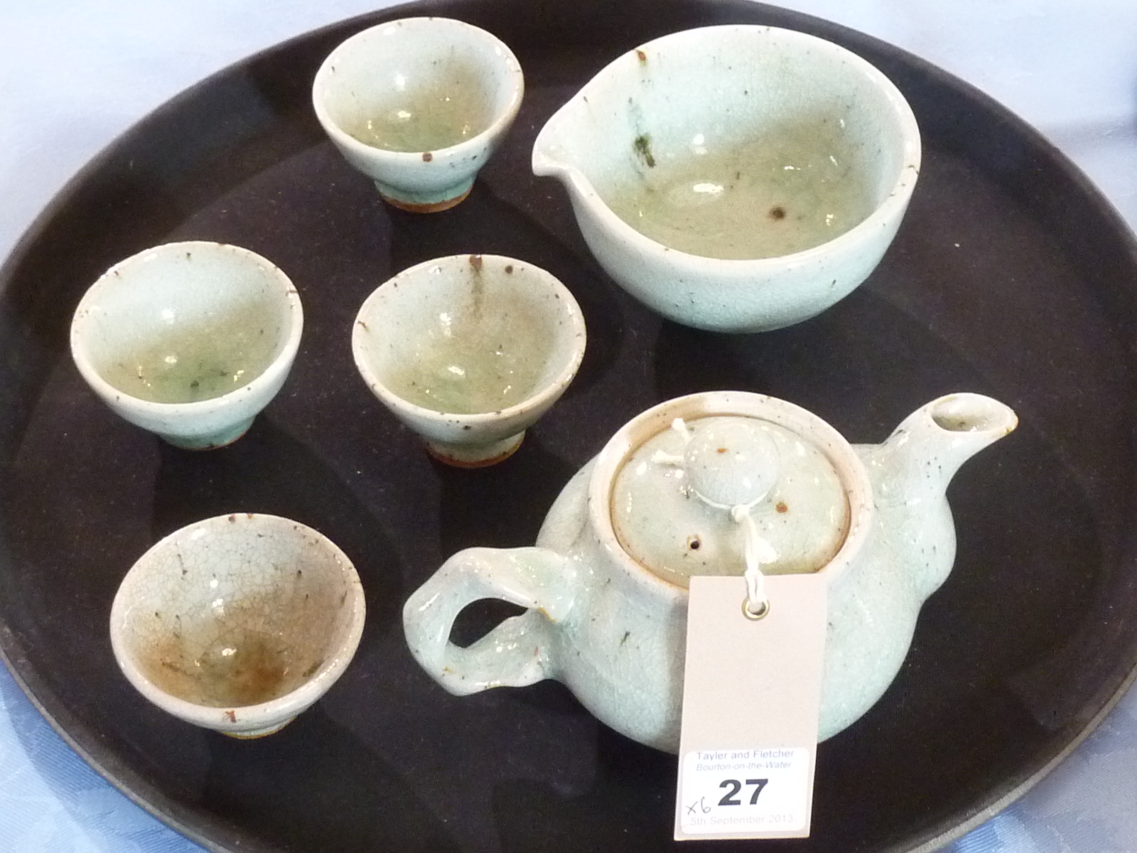 A 20th Century Korean Celadon crackle glazed Tea Set comprising Teapot, Water Cooler and Four Tea