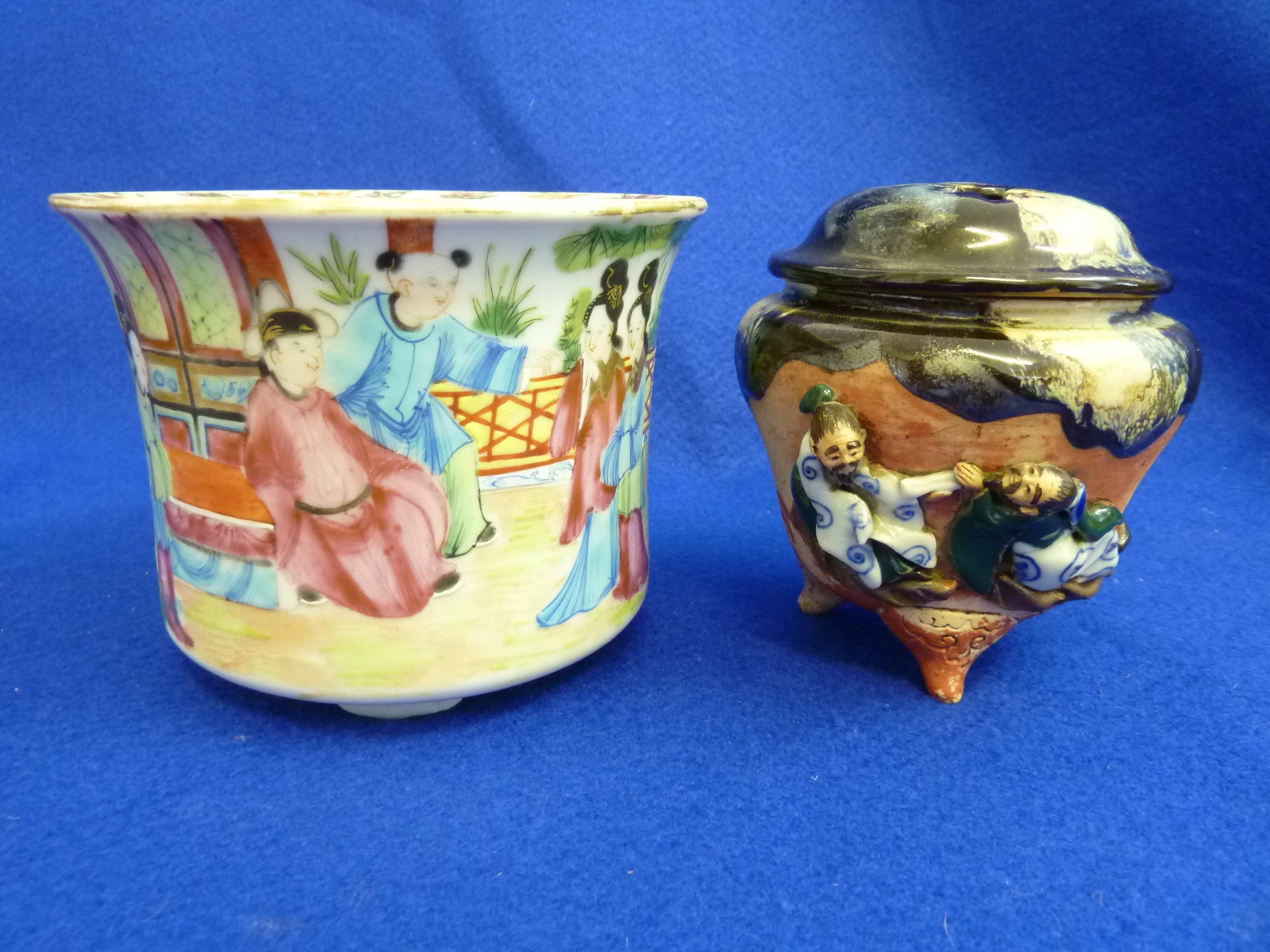 A 20th Century Japanese Studio Pottery Censer decorated with two figures wearing blue and white