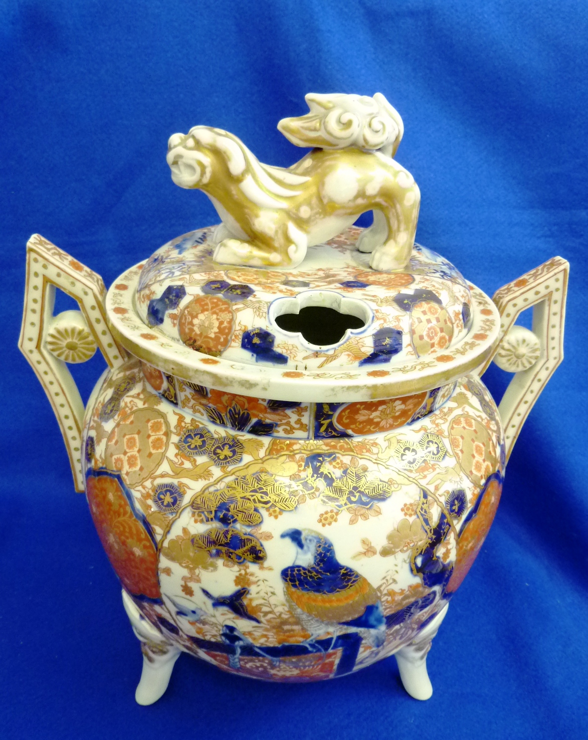 A large 19th Century Imari and gilt decorated Incense Burner, the cover surmounted with a gilded