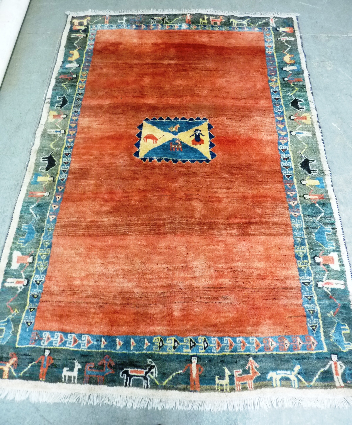 A large and heavy hand knotted woollen Tribal Carpet (possibly Afghanistan), central rectangular