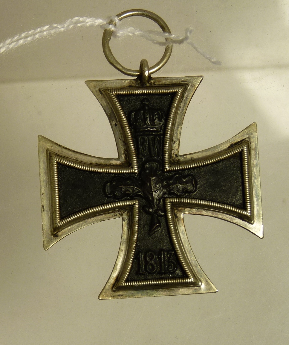 A German WWI type Iron Cross, stamped markings on suspension loop