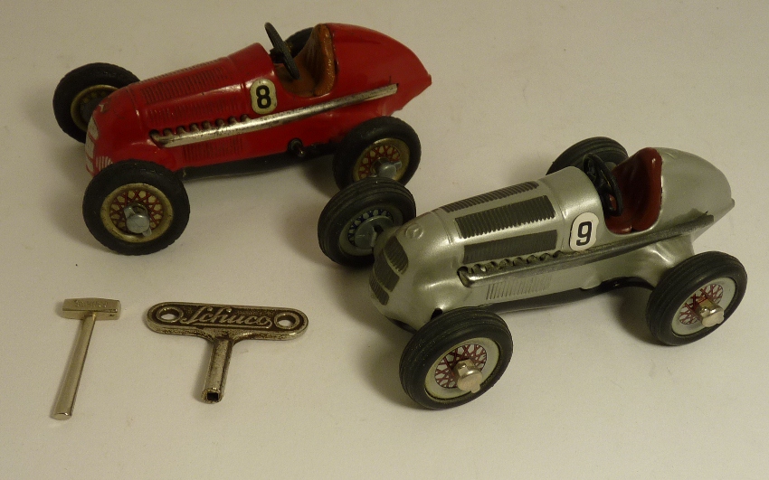 Schuco Studio clockwork steering Racing Car, silver no.9 together with another similar, red no.8