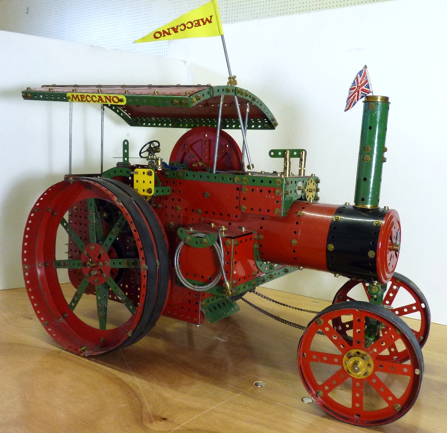 A large Meccano electric display model of a traction engine with canopy and chain drive, 62cms x