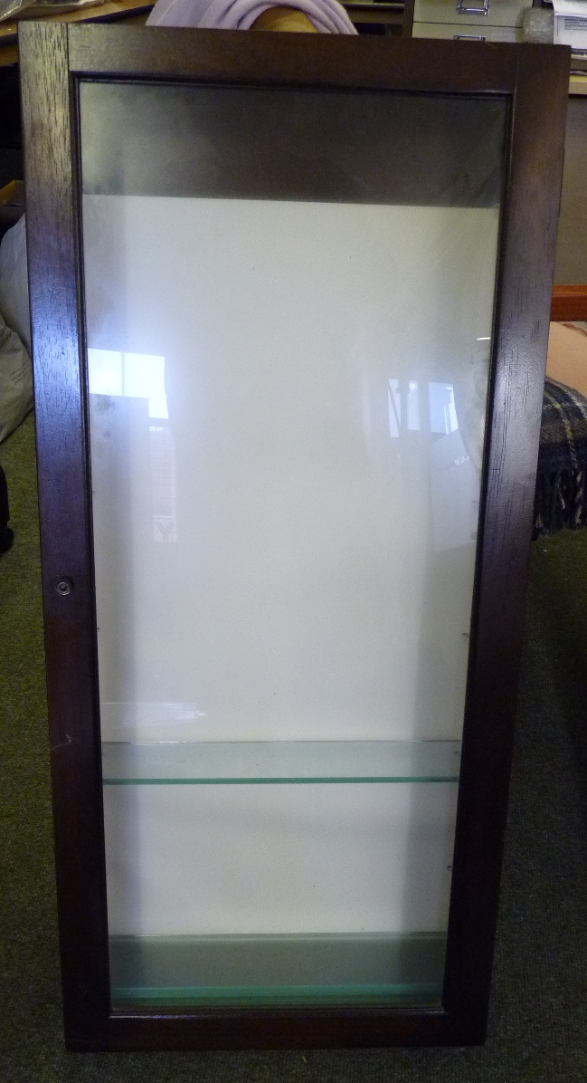 A wooden wall hanging display cabinet with glass shelves, 89cms x 41cms x 11cms deep