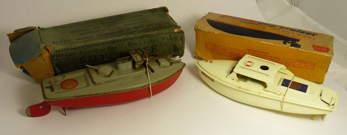 An early Sutcliffe clockwork model boat "Snappy" grey/red, with key and in original box and