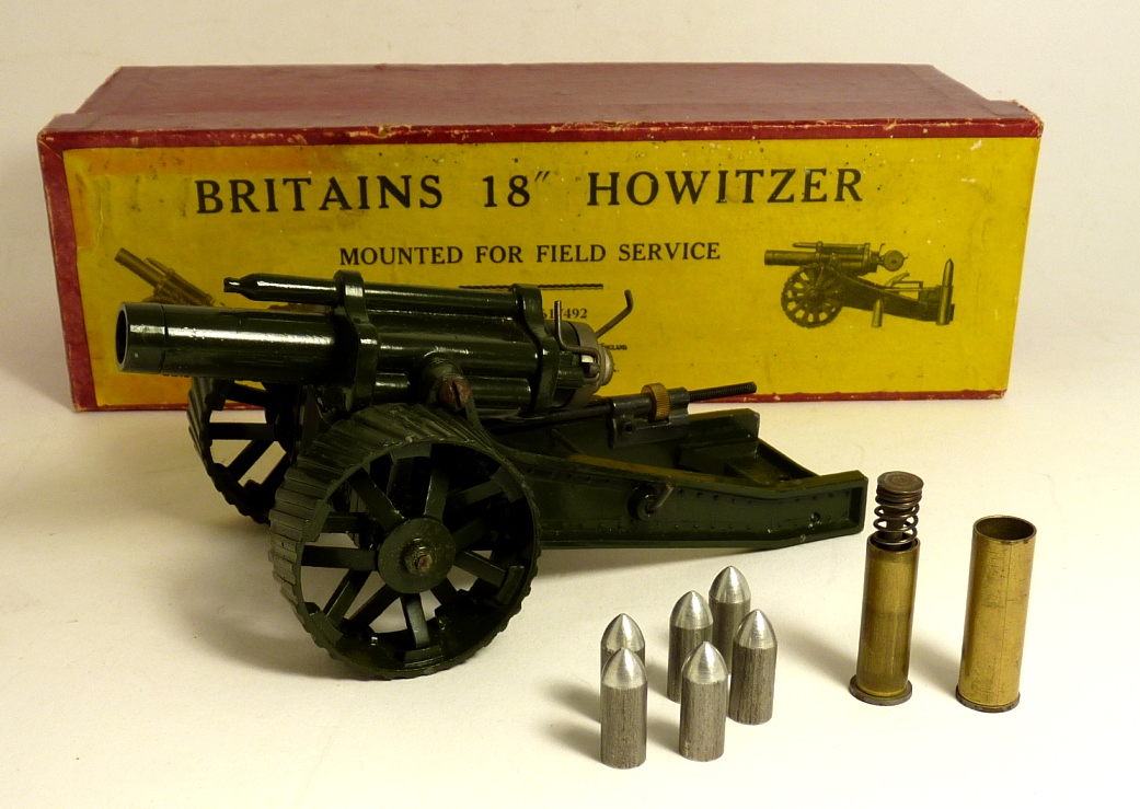 BRITAINS - 2107 18" Howitzer, gloss green, with 6 shells and two brass canisters, one sprung for