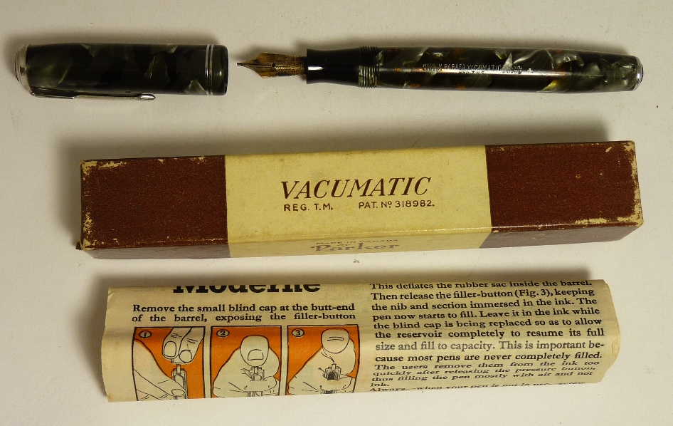 A Parker Vacumatic fountain pen in grey/brown marbled case (made in Canada) in original box with