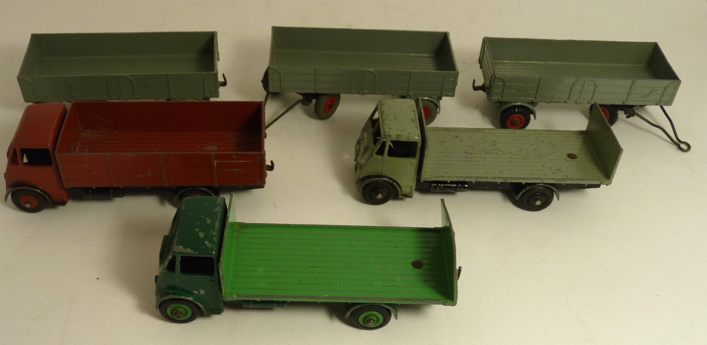 DINKY SUPERTOYS - Guy flatbed lorry with tailboard, grey; another similar dark green/light green;