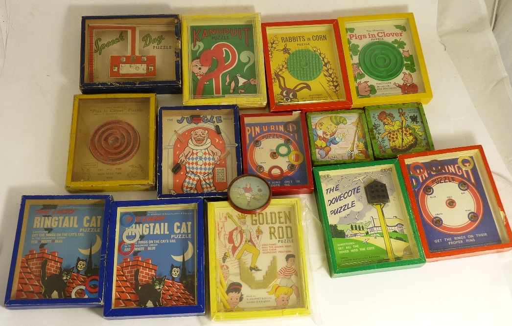 A quantity of boxed "skill" games by Journet & Co including Ringtail Cat, Rabbits in Corn and Pigs