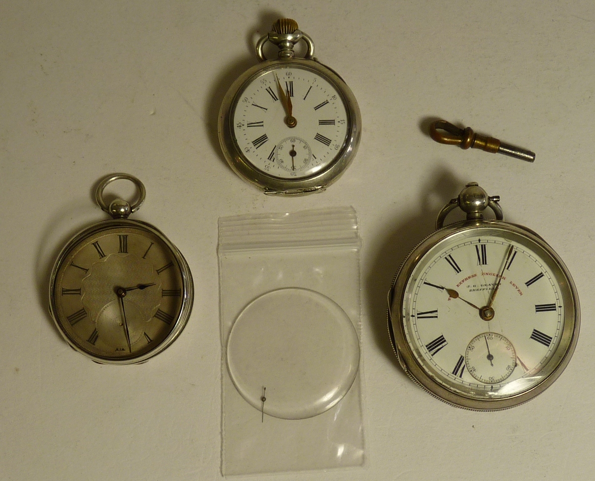 A silver cased open face pocket watch by J G Graves, Sheffield together with two other silver