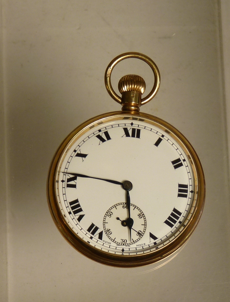 A 9ct gold cased, keyless, open face pocket watch with white enamel dial, black Roman numerals,