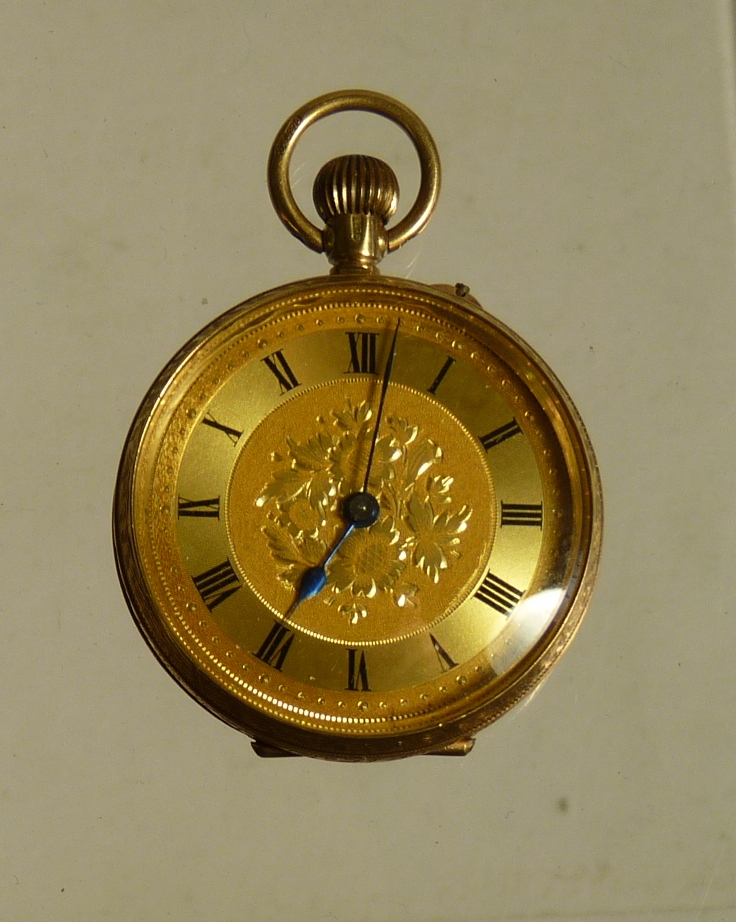 A Lady`s 9ct gold fob watch, the gold dial centred with floral decoration, Swiss movement, the