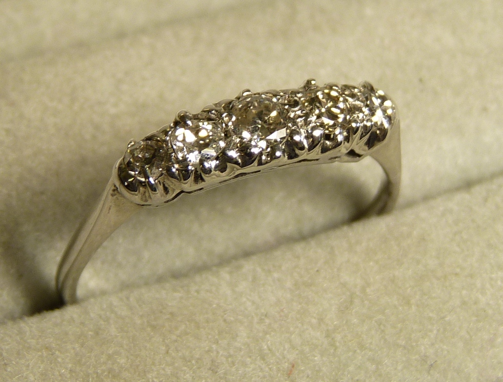 An 18ct white gold and platinum five stone diamond ring