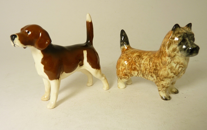 A Beswick Beagle, standing, together with a Cairn-type terrier, standing (2).