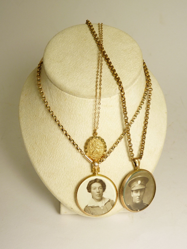 A 9ct gold pendant locket on a 9ct gold chain; a 9ct gold pendant locket on a metal chain and a