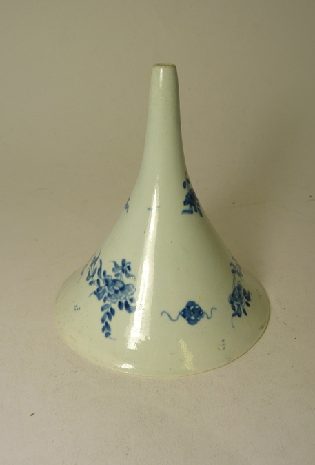 A late 18th/early 19th Century blue and white glazed wine funnel decorated in underglaze blue with