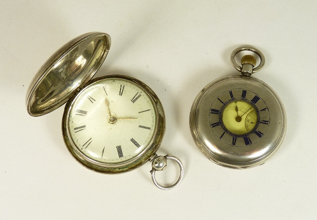 A Victorian silver cased half hunting pocket watch, hallmarked for Birmingham 1891, the movement