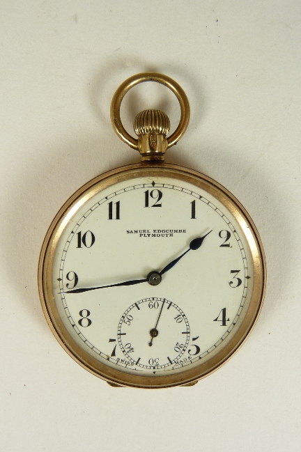A gents 9ct gold cased keyless wind pocket watch, with gold suspension loop and inner metal dust