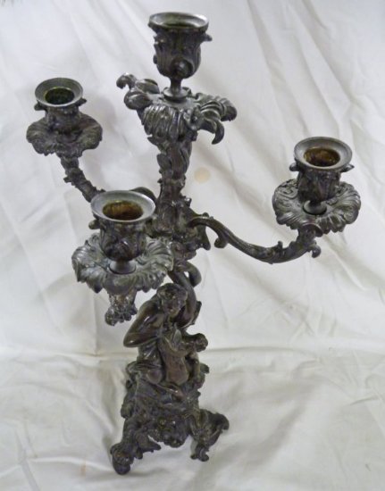 19TH CENTURY BRONZE FOUR-LIGHT CANDELABRUM OF MAN SEATED ON A HORSE BLOWING HIS HORN 45.5CM TALL