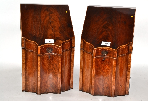 A Pair of George III Mahogany Knife Boxes, of typical concave fronted form, edged with boxwood,