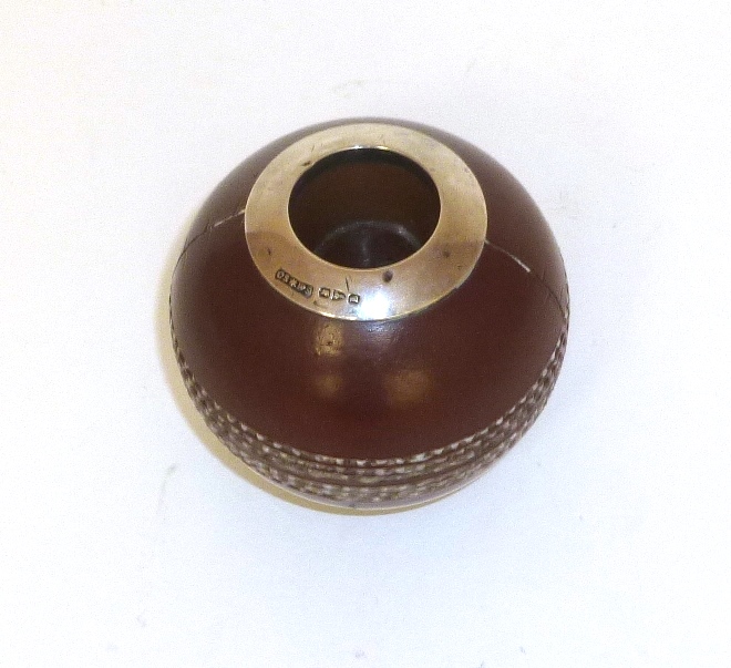 A Doulton Silicon Ware Match Ball in the Form of a Cricket Ball, impressed makers mark, also stamped