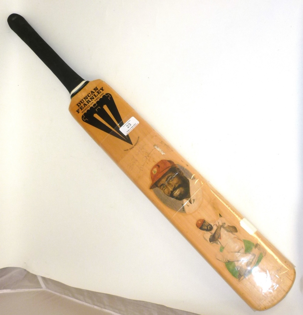 A Signed Limited Edition Viv Richards Cricket Bat, decorated with two colour illustrations and