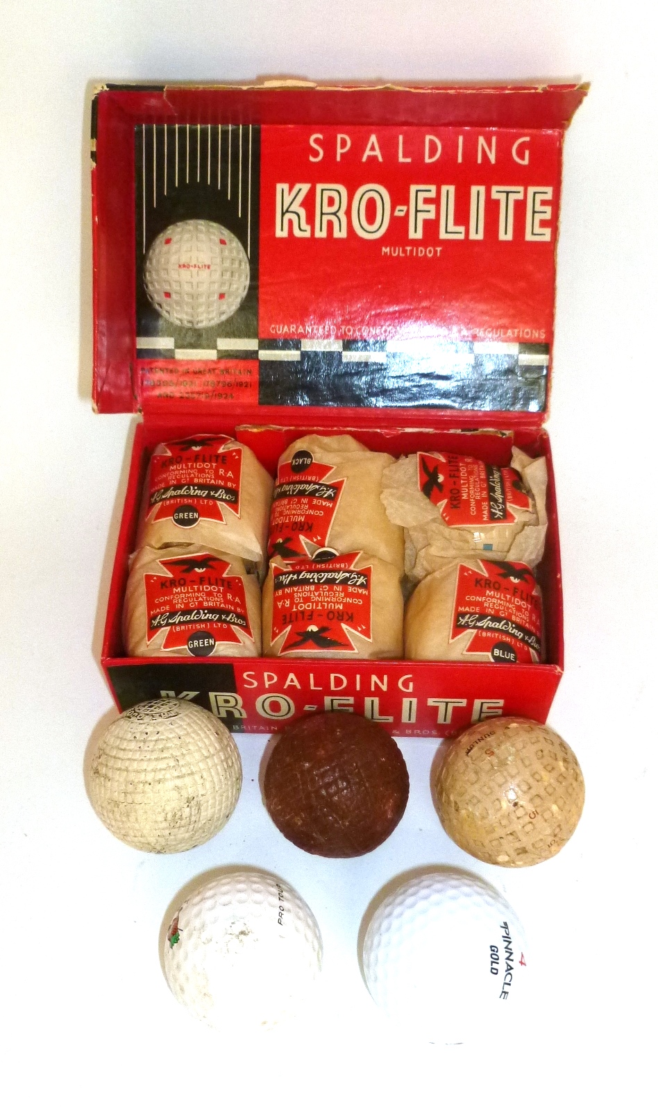 A Boxed Set of Six Unused Spalding Kro-Flite Multidot Golf Balls, still in their original wrappers