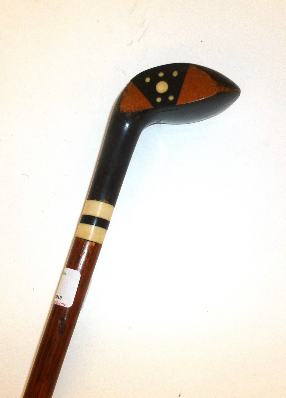 A Sunday Golf Walking Stick, the handle as a persimmon golf wood with ebony inlay