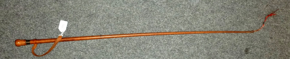 A Silver Mounted Leather Whip by Swaine, with London hallmarks, leather wrist strap