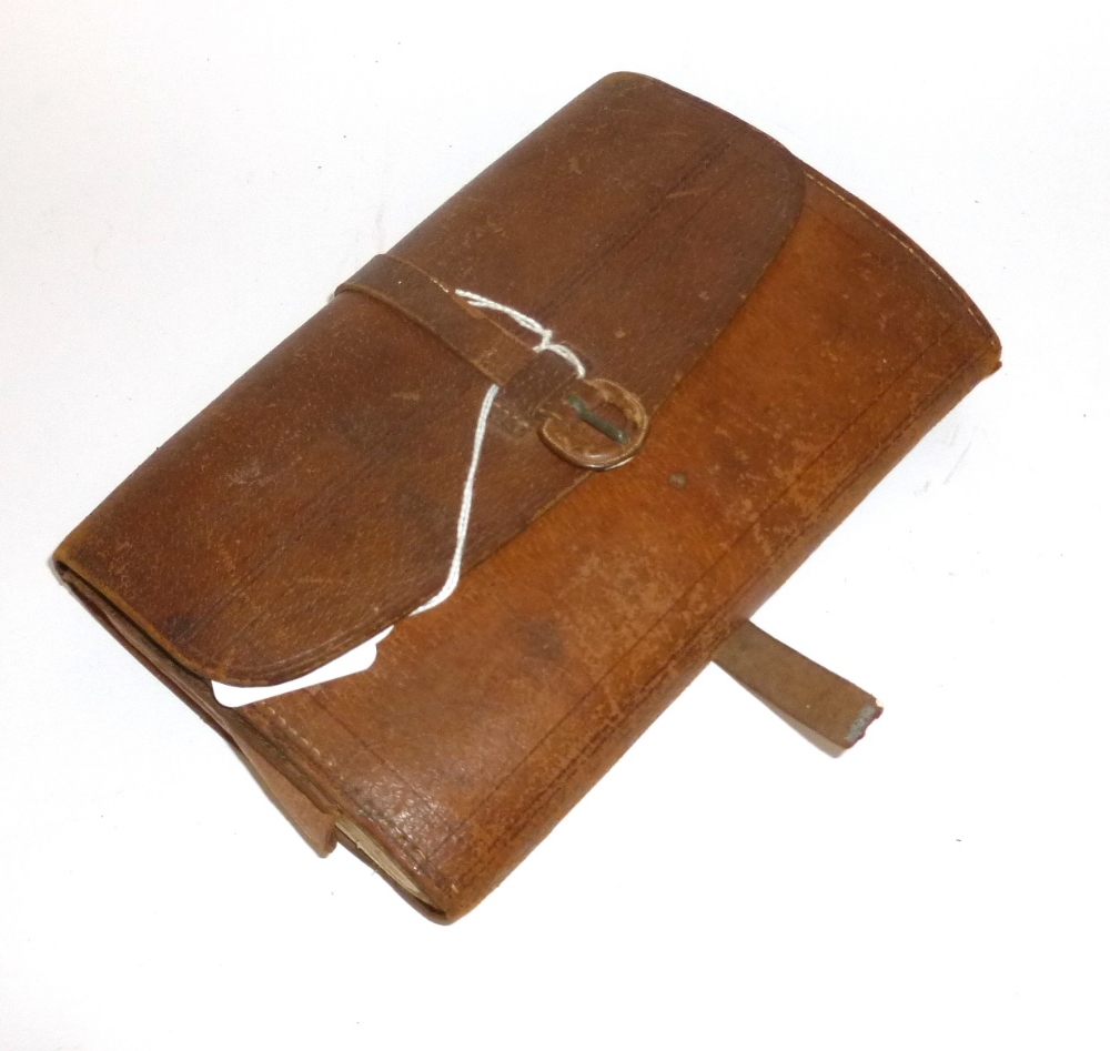 A Farlows Stitched Leather Fly Wallet, containing a collection of mainly trout flies with names