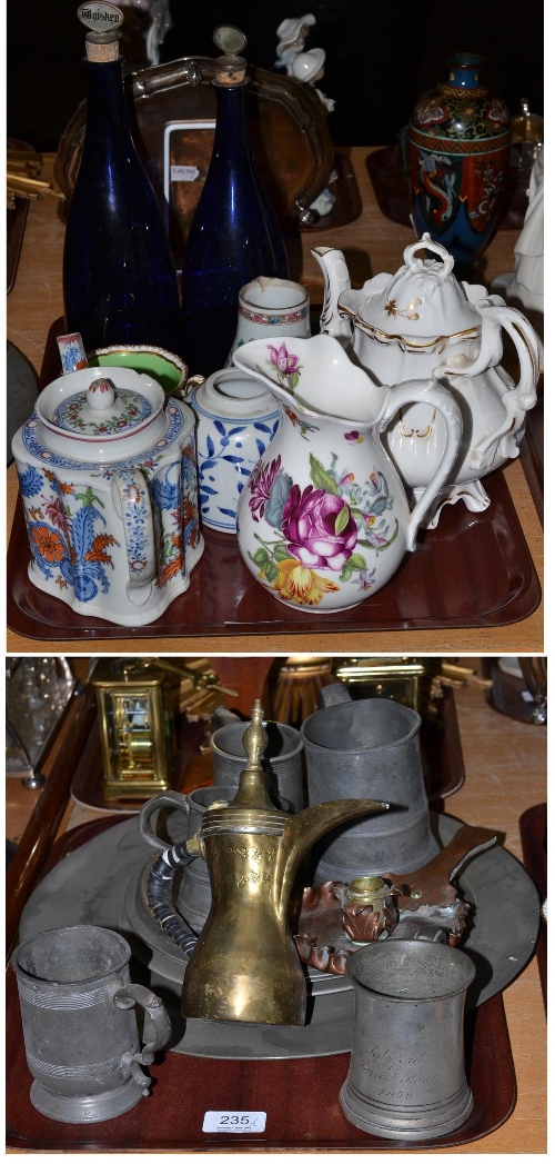 Two blue coloured decanters, pewter ware, two ceramic teapots, cups and saucers, floral milk jug